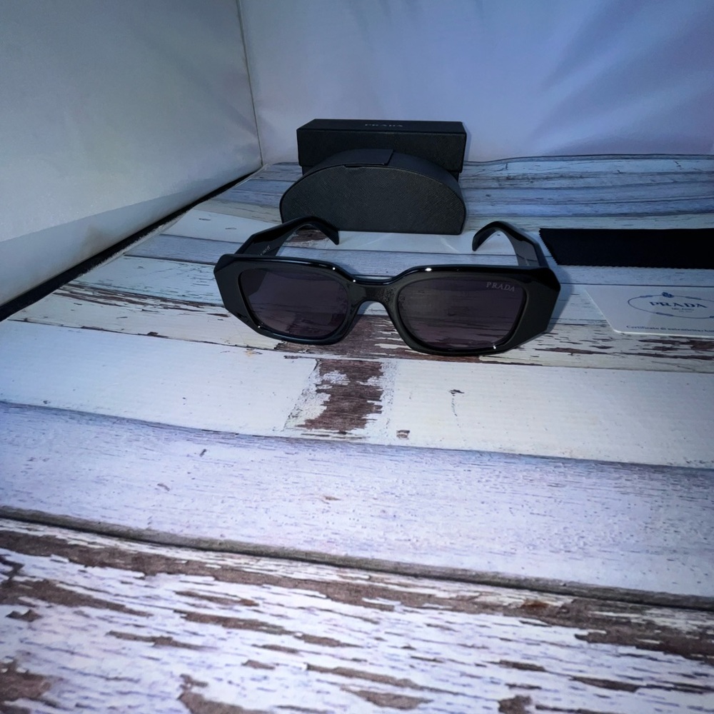 *BEST OFF TAKES IT* Prada sunglasses